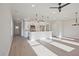 Open-concept living space featuring a modern kitchen and spacious living area at 101 Priestwood Ln, Acworth, GA 30102