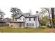 View of the back of the house from the backyard featuring covered patio at 355 Hilltop Cir Sw Ext, Mableton, GA 30126