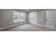 Neutral bedroom with carpet, a window, and new interior doors at 355 Hilltop Cir Sw Ext, Mableton, GA 30126