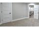 A bedroom with light grey walls, neutral carpet, white doors and white trim at 355 Hilltop Cir Sw Ext, Mableton, GA 30126