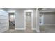 Bedroom showing access to the hall, walk-in closet, and Primary bathroom at 355 Hilltop Cir Sw Ext, Mableton, GA 30126