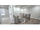 Hallway with wooden staircase, white walls, and neutral carpet in bedrooms at 355 Hilltop Cir Sw Ext, Mableton, GA 30126