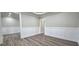 Bright living room featuring modern wood flooring and crisp white trim at 355 Hilltop Cir Sw Ext, Mableton, GA 30126