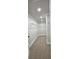 Walk-in closet with wire shelving and neutral carpeting at 355 Hilltop Cir Sw Ext, Mableton, GA 30126