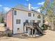Exterior shot showcasing a spacious backyard with a deck and patio at 3795 Duckcove Way, Cumming, GA 30041