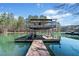 Private dock offers the perfect spot for relaxing and enjoying waterfront living at 3795 Duckcove Way, Cumming, GA 30041