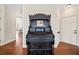 Hallway features an antique-style writing desk and access to other rooms in the house at 3795 Duckcove Way, Cumming, GA 30041