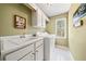 Clean laundry room featuring white appliances, cabinets, and a view to the outside at 3795 Duckcove Way, Cumming, GA 30041