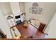 Elevated view of the living room highlighting the fireplace, built-ins, and soaring windows at 3795 Duckcove Way, Cumming, GA 30041