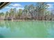 This property boasts beautiful waterfront views and access to the lake at 3795 Duckcove Way, Cumming, GA 30041