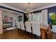 Bright dining room with seating for six and an adjacent open floorplan great for entertaining at 447 Lacy Rd, Canton, GA 30115