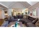 Spacious living room showcasing a large sectional sofa with views of the kitchen and vaulted ceilings at 447 Lacy Rd, Canton, GA 30115