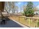 Back deck with wooden railings and shaded seating overlooking the backyard at 857 Dill Sw Ave, Atlanta, GA 30310