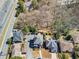 Aerial view showcases a large lot surrounded by neighborhood homes and roads at 1734 Summit Glen, Atlanta, GA 30329