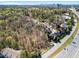 Wide aerial view of a community near green space and a bustling highway at 1734 Summit Glen, Atlanta, GA 30329