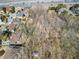 Aerial view of large lot with neighborhood and busy highway nearby at 1734 Summit Glen, Atlanta, GA 30329