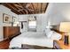 Bright bedroom featuring a ceiling fan and hardwood floors at 1791 Harper Nw St # H, Atlanta, GA 30318