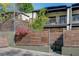 Modern townhome featuring horizontal wood-slat fence and a private balcony at 1791 Harper Nw St # H, Atlanta, GA 30318