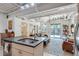 Kitchen island with seating and open living area with a metal ceiling at 1791 Harper Nw St # H, Atlanta, GA 30318