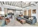 Open living space with a large gray sofa and exposed ductwork at 1791 Harper Nw St # H, Atlanta, GA 30318