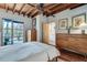Cozy main bedroom with a ceiling fan, access to a balcony, and an ensuite bathroom at 1791 Harper Nw St # H, Atlanta, GA 30318