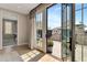 The french doors open to the beautiful balcony to seamlessly merge indoor/outdoor living at 250 4Th St, Fayetteville, GA 30214