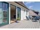 The deck features a seating area with comfortable chairs and a table with views of the neighborhood at 250 4Th St, Fayetteville, GA 30214