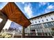 Modern mixed-use building with stylish architectural features and a covered outdoor area at 250 4Th St, Fayetteville, GA 30214