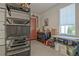 Garage with work bench, storage shelves, and neat organization at 250 4Th St, Fayetteville, GA 30214