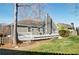 Lush backyard with a well-manicured lawn and wooden deck for outdoor enjoyment and entertaining at 2593 Abbotts Glen Nw Dr, Acworth, GA 30101