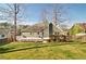 A nicely maintained lawn and deck grace the rear of this home with its neutral paint scheme and fenced yard at 2593 Abbotts Glen Nw Dr, Acworth, GA 30101