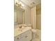 Well-lit bathroom features a shower/tub, vanity, and patterned tile floors at 2593 Abbotts Glen Nw Dr, Acworth, GA 30101