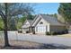 Attractive exterior view of community clubhouse with professional landscaping and ample parking at 2593 Abbotts Glen Nw Dr, Acworth, GA 30101