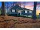 Charming two-story home with two-car garage and mature trees at 2593 Abbotts Glen Nw Dr, Acworth, GA 30101
