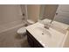 Bathroom with tub, shower, and single sink vanity at 4440 Cedar Bridge Walk, Suwanee, GA 30024