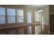 Bright dining area with hardwood floors and access to the kitchen at 4440 Cedar Bridge Walk, Suwanee, GA 30024