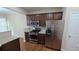 Well-equipped kitchen boasts stainless steel appliances and stylish cabinetry at 4440 Cedar Bridge Walk, Suwanee, GA 30024
