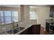 Beautiful kitchen with stainless steel appliances and granite counters, ready to cook at 4440 Cedar Bridge Walk, Suwanee, GA 30024