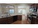 Bright kitchen with stainless steel appliances and granite countertops, perfect for cooking at 4440 Cedar Bridge Walk, Suwanee, GA 30024