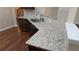 Modern kitchen featuring granite countertops and stainless steel sink and faucet at 4440 Cedar Bridge Walk, Suwanee, GA 30024