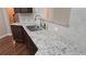 Spacious kitchen featuring granite countertops, stainless steel appliances, and a modern faucet at 4440 Cedar Bridge Walk, Suwanee, GA 30024