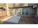 A patio with windows and a door, offering a seamless indoor-outdoor transition at 4440 Cedar Bridge Walk, Suwanee, GA 30024