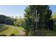 Community trail sign pointing the way to outdoor adventures at 4440 Cedar Bridge Walk, Suwanee, GA 30024