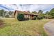 Charming single-story home with wood siding and mature landscaping in a quiet, spacious neighborhood at 5687 Highway 212, Covington, GA 30016