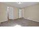 Neutral bedroom with carpeted floors, a window, and a closet is move-in ready at 2739 Council St, Lithonia, GA 30058