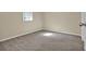 This carpeted bedroom has a neutral palette, great for relaxation and customization at 2739 Council St, Lithonia, GA 30058
