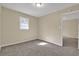 Neutral bedroom with carpeted floors and natural light is perfect for personalizing at 2739 Council St, Lithonia, GA 30058