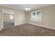 Dining room featuring neutral paint, plush carpeting, and a modern chandelier at 2739 Council St, Lithonia, GA 30058