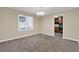 Dining area featuring a view into the kitchen, neutral paint, and plush carpet at 2739 Council St, Lithonia, GA 30058
