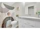 Cozy, updated bathroom with patterned shower curtain and modern vanity at 404 Queensbury Pl, Acworth, GA 30102